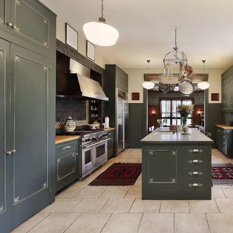 Dark green painted kitchen cabinets